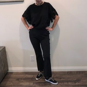 Black top with lace details.